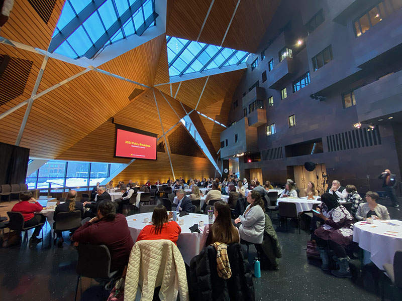 Policy Breakfast attendees look on as a Policy Breakfast is held inside McNamara Alumni Center